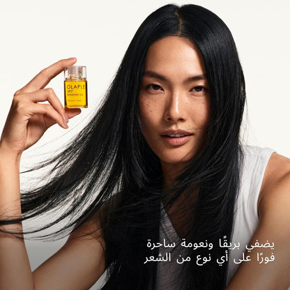 Olaplex No.7 Bonding Oil 30mL - product being applied