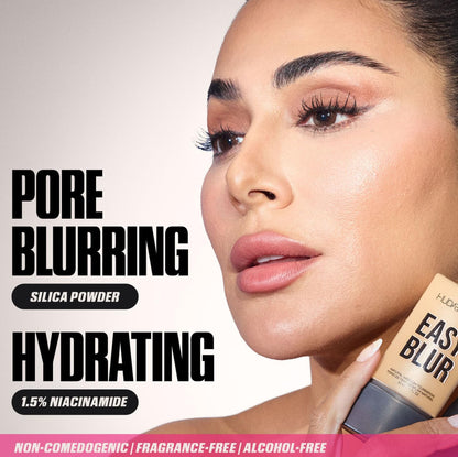 Huda Beauty Easy Blur Foundation 30ML - product being applied (view 3)