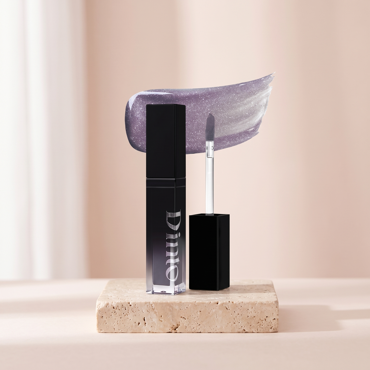 DINTO Pearl-Kissed Plumping Lip Glace styled on travertine pedestal, blush studio