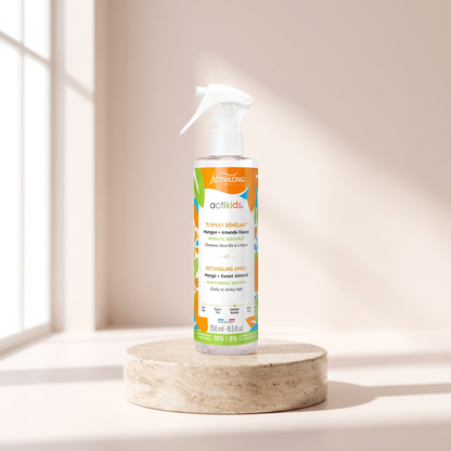 Activilong Actikids Detangling Spray 250 ml styled on travertine pedestal, blush studio