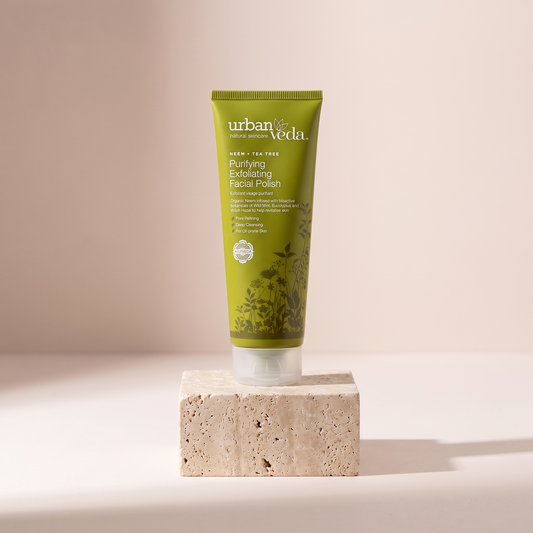 Urban Veda Purifying Exfoliating Facial Polish 125 ml styled on travertine pedestal, blush studio