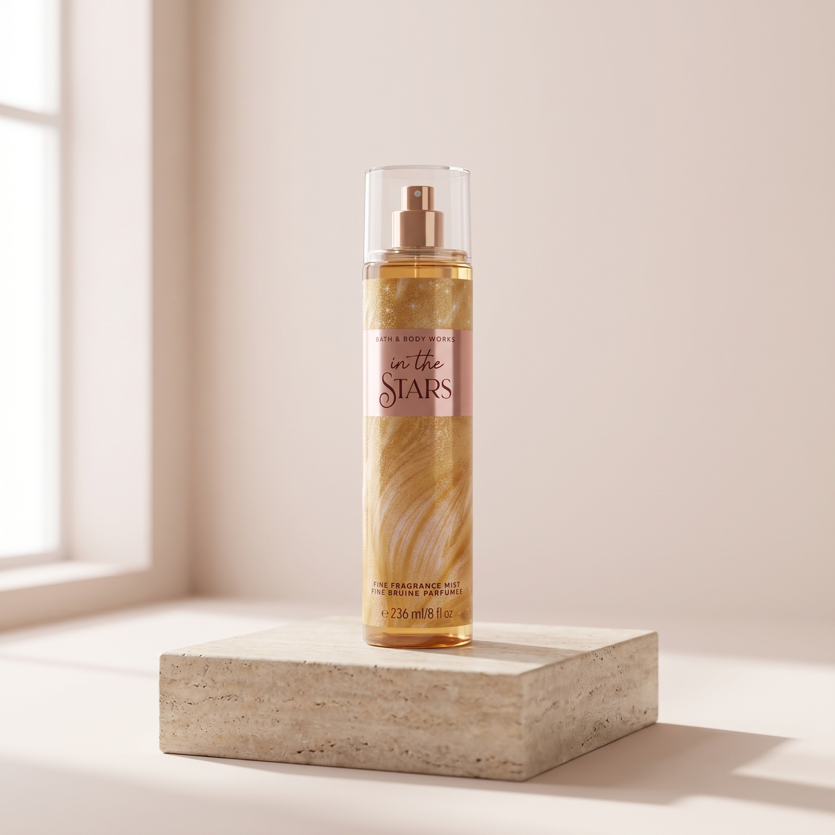 Bath and Body Works In The Stars Fine Fragrance Mist 236 ml styled on travertine pedestal, blush studio