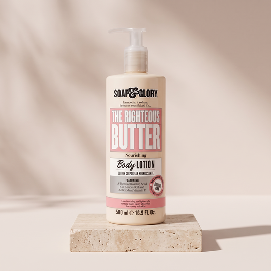 Soap and Glory The Righteous Butter Body Lotion 500 ml styled on travertine pedestal, blush studio