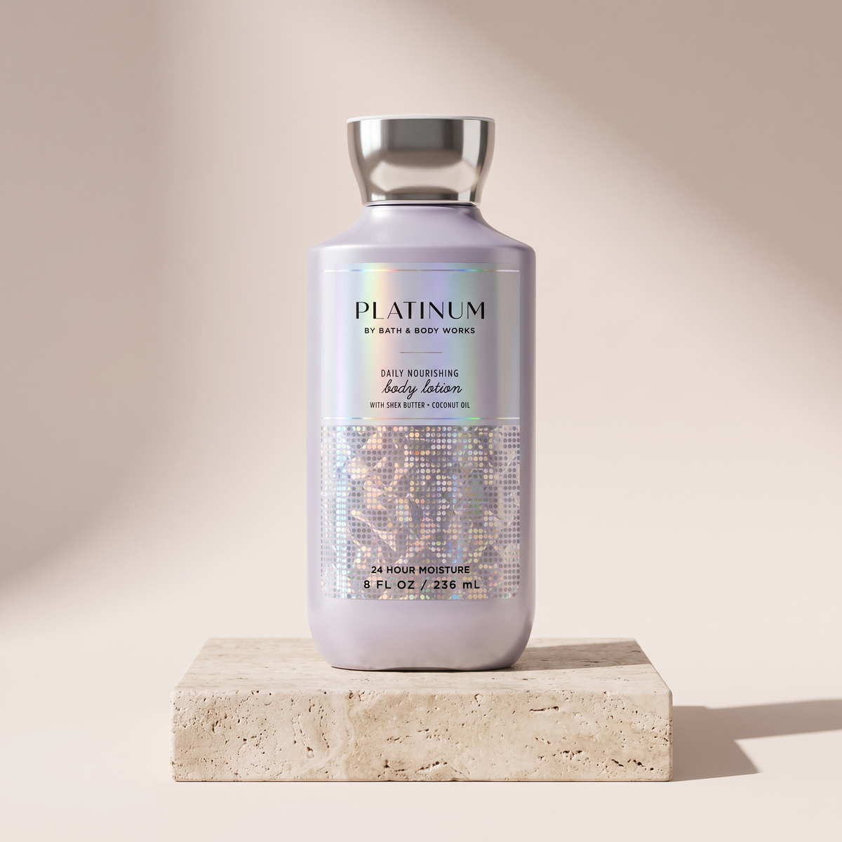 Bath and Body Works Platinum Body Wash 295 ml styled on travertine pedestal, blush studio