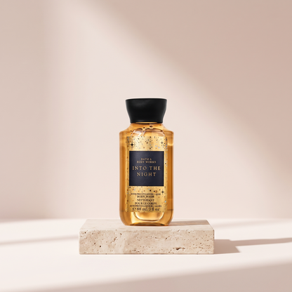 Bath and Body Works Into the Night Body Wash 295 ml styled on travertine pedestal, blush studio