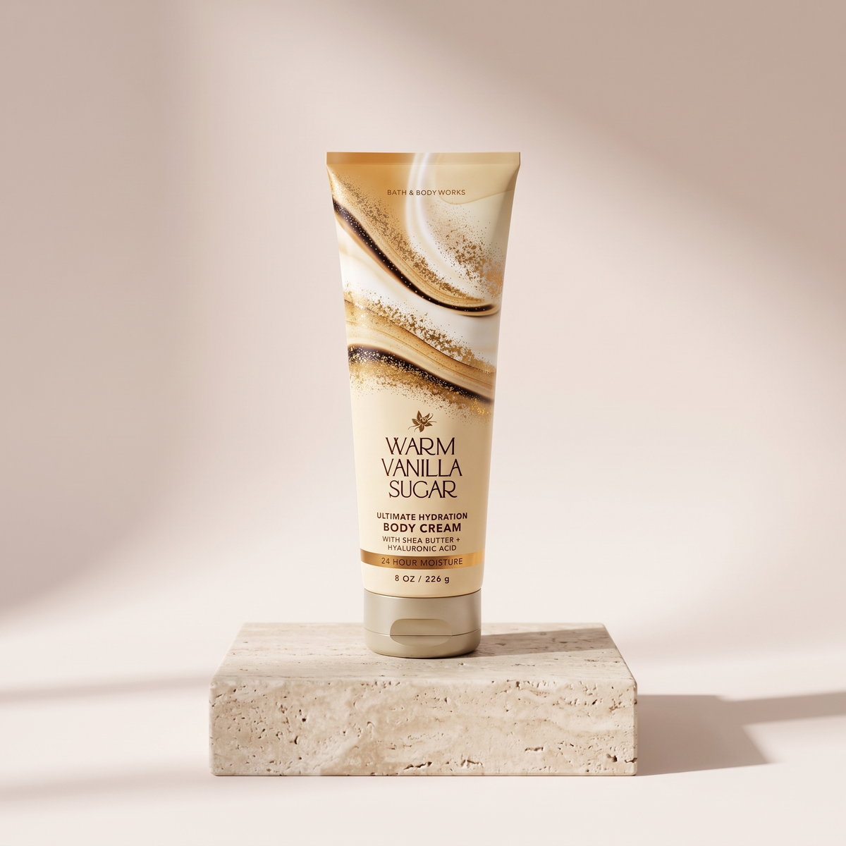 Bath and Body Works Warm Vanilla Sugar Body Cream 226 g styled on travertine pedestal, blush studio