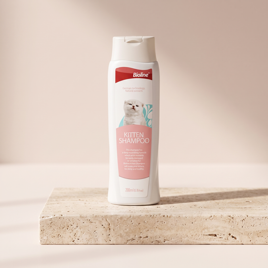 Bioline Kitten Shampoo gentle cleansing styled on travertine pedestal, blush studio