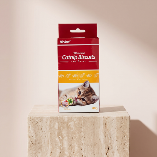 Bioline Catnip Biscuits cod flavour cat treats styled on travertine pedestal, blush studio